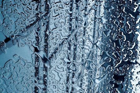 Raindrops on mirror ideal for unique abstract wallpapers.