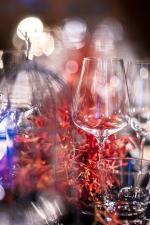 Abstract empty glasses on fine dinngin table restaurantの写真素材
