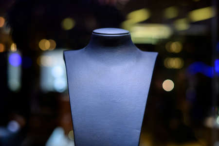 Clear mannequin jewelry in luxury jewelry boutique displayの写真素材