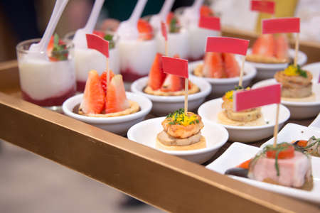 finger food serve on wooden slate platter