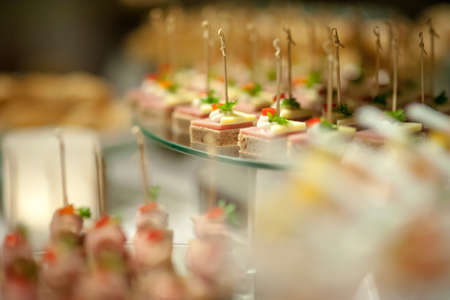 finger food serve on glasses slate platterの写真素材