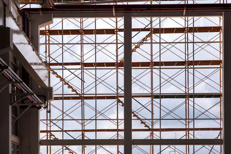 Grid of scaffolding elements in a construction site.の写真素材