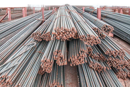 A lot of steel rods used to reinforce concrete in huge construction site