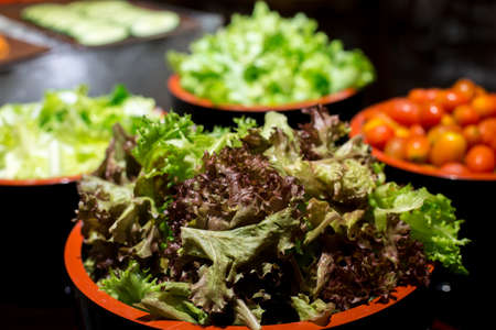 salad bar with vegetables in the restaurant, healthy foodの写真素材