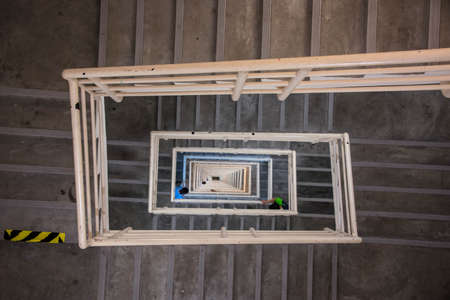 abstract perspective from fire escape of high business tower building