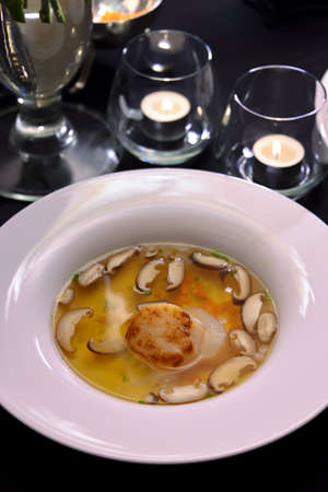 Scallop with shitake clear soupの写真素材