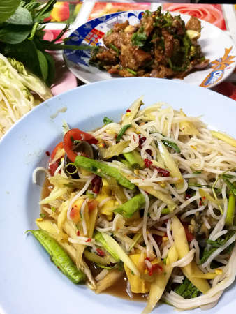 Thai style spicy papaya Salad (Som tum)の写真素材