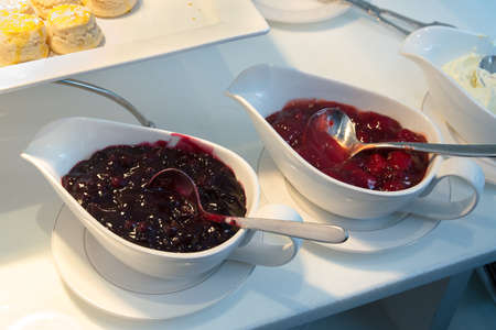 Blueberries and strawberries jam on hotel line catering serviceの写真素材