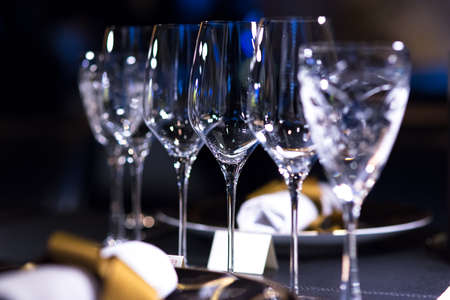 Empty glasses set on fine dining restaurantの写真素材
