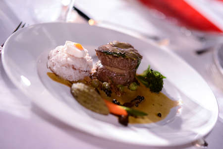 grilled beef steaks with rice and curry sauceの写真素材