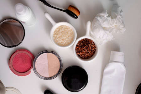 used up cosmetic packaging on white backgroundの写真素材