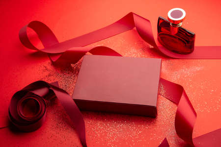 empty red box on red background with glitterの写真素材