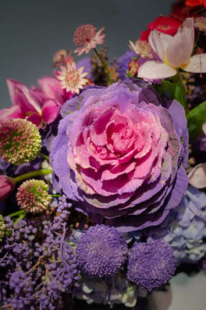 Purple flowers in bunch of vivid flower decorationの写真素材