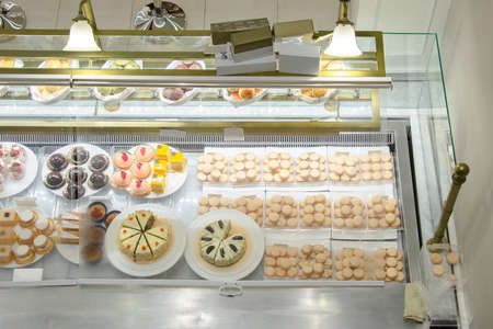 assorted of bake and sweet in bakery window displayの写真素材