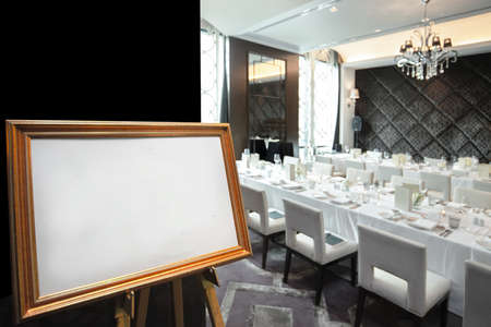 blank frame in hotel fine dining roomの写真素材