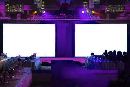 2 giant blank screen behind the stage connect with fashion show runway