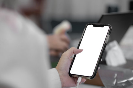 People tapping finger on blank screen smartphoneの写真素材