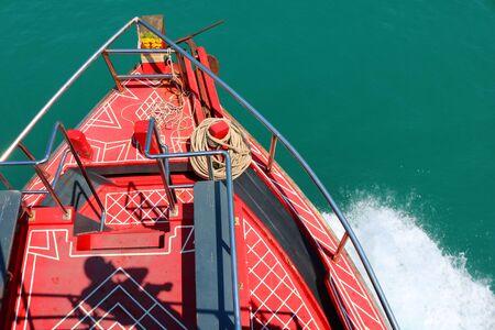 Boat tour with the shadow of the photographer.