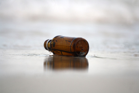 The bottle on the beach.の写真素材