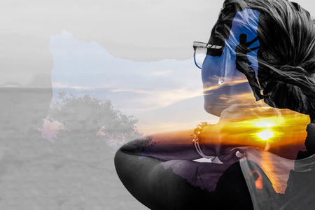 Woman imagination by using the program to included two images together.の写真素材