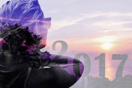 New year 2017 with woman imagination background .Using the program color range and clipping mask to included two images togetherの写真素材