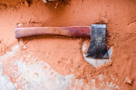 The axe on the sawdust.の写真素材