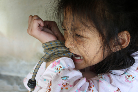 Asian human trafficking concept.Rope tied the hands of Thai girls.の写真素材