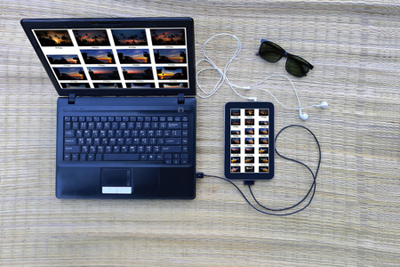 Computer and communications equipment on the mat in summer.