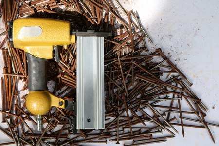 Air Nailer with rusty nail.の写真素材