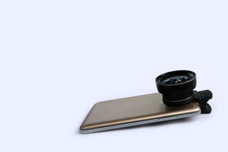 Clip lens for connect with mobile phones in white background.の写真素材