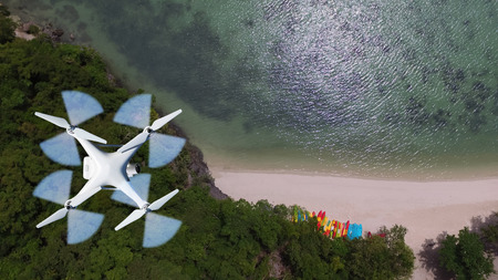 Drones camera flying in the sky with ocean lagoon views by the beach.の写真素材