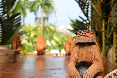 Coconut Monkey souvenirs sold on the street at Samui island Thailandの写真素材