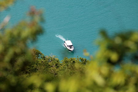Top view on the mountain with Tour boat in the ocean background at Ang Thong archipelago in Thailand.の写真素材