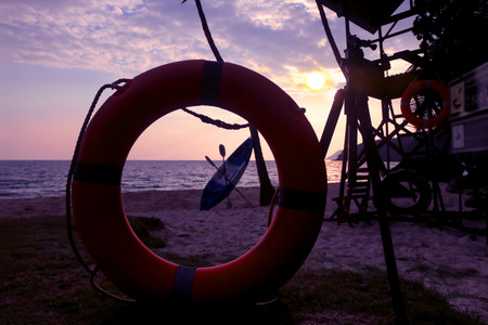 lifeguard tower at sunrise sky on coconut beach in Thailand.の写真素材
