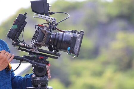 Videographer are shooting on the top of the mountain, Nature views background.の写真素材