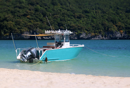 Speedboat for fishing is moored on the beach at Koh Samui, Thailand.