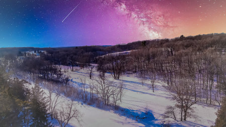 Twilight sky over winter landscape.
