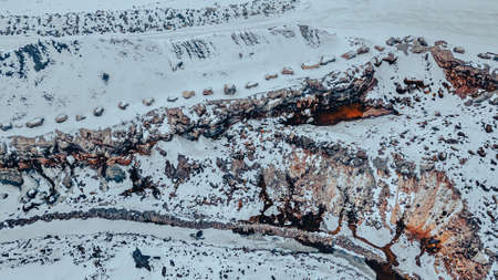 Snow covers this rock quarry but it still shows activity regardless of season