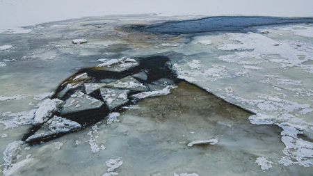 Freshly broken surface on lake.