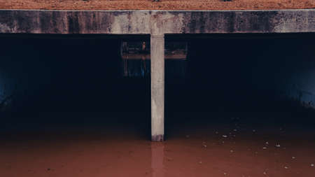 Storm drains fill up and over flow as nature floods through the tunnels