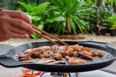 Korean traditional grilled BBQ food, samgyupsal, pork with gochujang and Grilled Pork Neck on hot...
