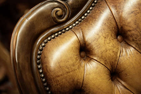 close up of a brown chair with wooden finishの写真素材
