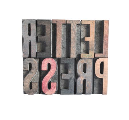 the word 'letterpress' in wood type, isolated on whiteの写真素材