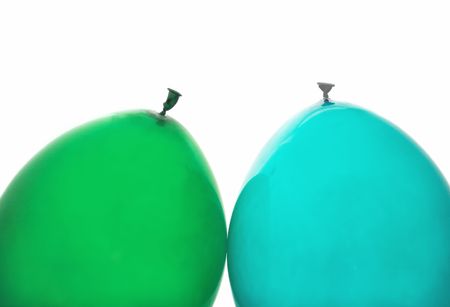 green and blue balloons isolated on whiteの写真素材