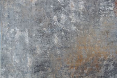 abstract background from a piece of weathered old metal with rustの写真素材
