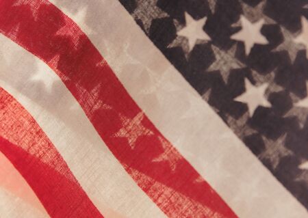 two backlit American flags useful for a background の写真素材