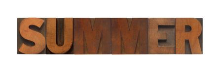 the word summer in old wood typeの写真素材