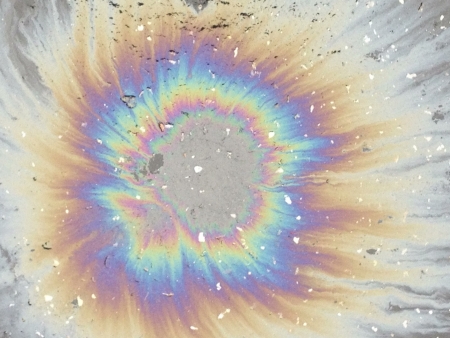 asphalt surface with oil stain