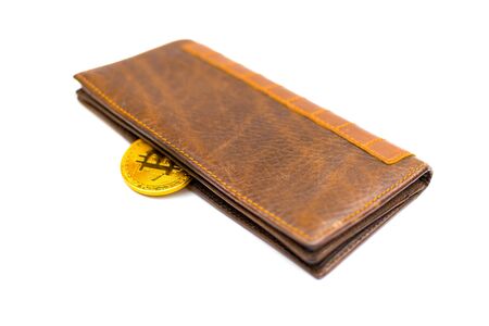 Bitcoin in purse on a white background. Isolated.の写真素材