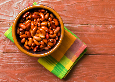 Red beans in a deep plate.の写真素材